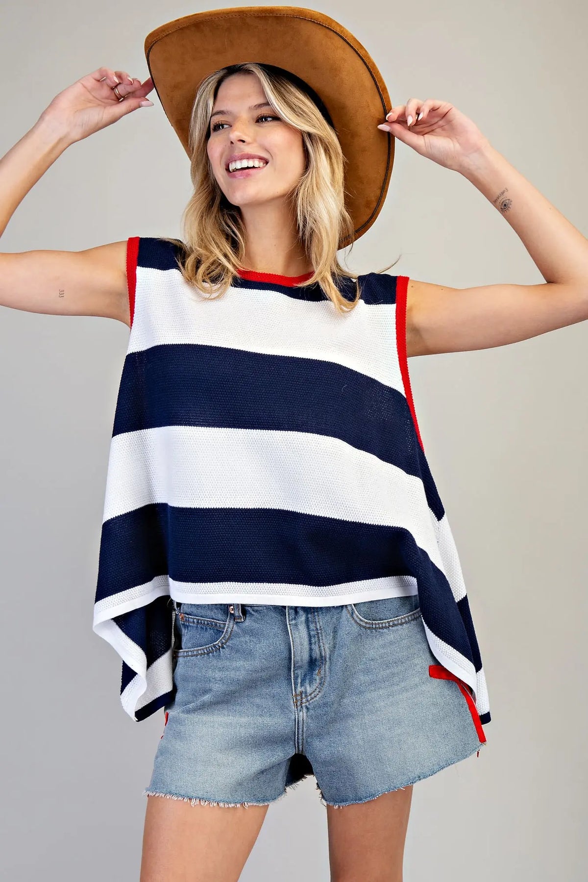 EE:SOME Striped Shark Bite Hem Knit Top
